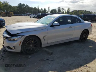 2015 BMW 4 Series 428i xDrive with VIN WBA3T1C55FP820797, listed as a Copart auction lot 74568794 with Not Provided miles and Salvage Title. Bid and sale history available at carsss.com. Image 1.