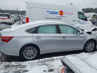 2016 Toyota Avalon XLE Premium z VIN 4T1BD1EB0GU049999, wystawiony jako IAAI lot #41624589 z przebiegiem 61 785 mil mil oraz . Historia ofert i sprzedaży dostępna na DreamBid. Obrazek 12.