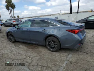 2019 Toyota Avalon Limited Hybrid z VIN 4T1B21FB3KU003922, wystawiony jako Copart lot #69477182 z przebiegiem 57 921 mil mil oraz . Historia ofert i sprzedaży dostępna na DreamBid. Obrazek 2.