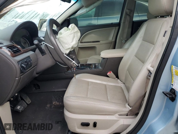 2009 Ford Taurus Limited z VIN 1FAHP25WX9G101791, wystawiony jako Copart lot #56671645 z przebiegiem 120 918 mil mil oraz Nie do naprawy • Non repairable. Historia ofert i sprzedaży dostępna na DreamBid. Obrazek 7.