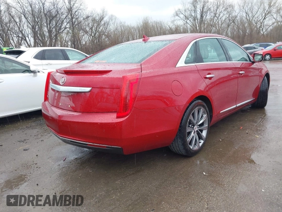 2013 Cadillac XTS z VIN 2G61N5S36D9129188, wystawiony jako IAAI lot #41824147 z przebiegiem 80 985 mil mil oraz . Historia ofert i sprzedaży dostępna na DreamBid. Obrazek 4.