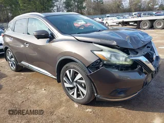 2015 Nissan Murano Platinum z VIN 5N1AZ2MGXFN243612, wystawiony jako IAAI lot #41427694 z przebiegiem 145 902 mil mil oraz . Historia ofert i sprzedaży dostępna na DreamBid. Obrazek 1.