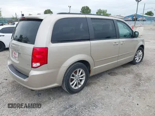 2014 Dodge Grand Caravan SXT z VIN 2C4RDGCG2ER372983, wystawiony jako IAAI lot #42369214 z przebiegiem 148 756 mil mil oraz . Historia ofert i sprzedaży dostępna na DreamBid. Obrazek 4.
