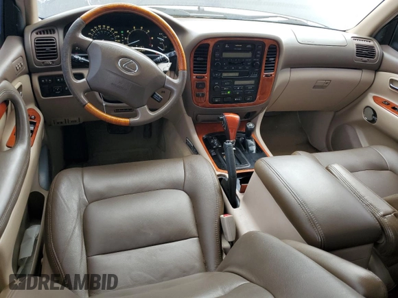 2001 Lexus LX 470 z VIN JTJHT00W513509447, wystawiony jako Copart lot #43988595 z przebiegiem 251 861 mil mil oraz Tytuł czysty. Historia ofert i sprzedaży dostępna na DreamBid. Obrazek 8.