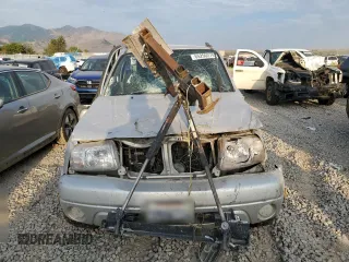 2004 Suzuki Grand Vitara LX z VIN JS3TD62V744104983, wystawiony jako Copart lot #65290274 z przebiegiem Nie podano mil oraz Szkoda całkowita • Salvage title. Historia ofert i sprzedaży dostępna na DreamBid. Obrazek 5.