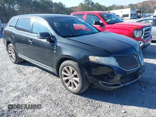 2013 Lincoln MKT with VIN 2LMHJ5FK9DBL56134, listed as a IAAI auction lot 41003176 with 292,292 mi miles and . Bid and sale history available at DreamBid. Image 1.