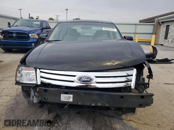 2009 Ford Taurus SE with VIN 1FAHP23W39G121125, listed as a Copart auction lot 80436544 with 122,908 mi miles and Clean Title. Bid and sale history available at carsss.com. Image 5.