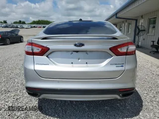 2016 Ford Fusion Titanium z VIN 3FA6P0D94GR181179, wystawiony jako Copart lot #56987005 z przebiegiem 79 841 mil mil oraz Czysty tytuł • Clean title. Historia ofert i sprzedaży dostępna na DreamBid. Obrazek 6.