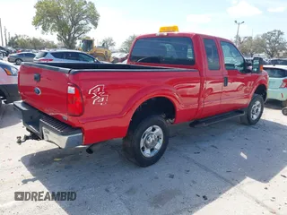 2011 Ford F-250 XL with VIN 1FT7X2B64BED07975, listed as a IAAI auction lot 41586509 with 74,010 mi miles and . Bid and sale history available at DreamBid. Image 4.