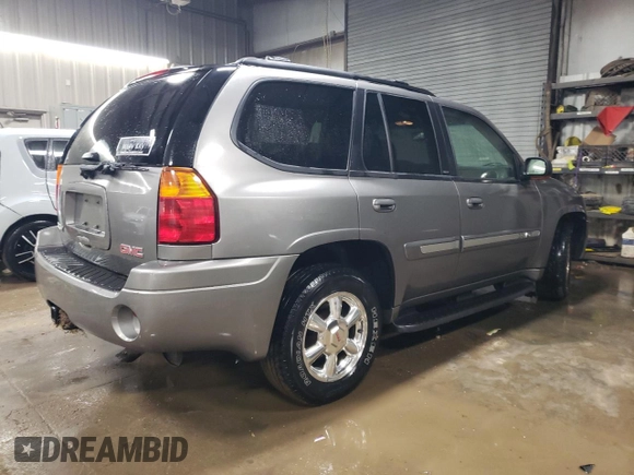 2005 GMC Envoy SLE with VIN 1GKDT13S952334233, listed as a Copart auction lot 85115854 with 221,131 mi miles and Salvage Title. Bid and sale history available at carsss.com. Image 3.