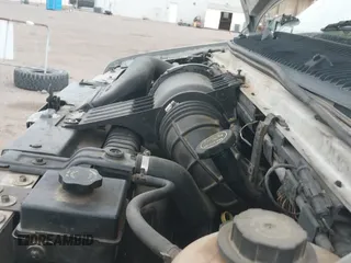 2003 Ford Econoline Cargo z VIN 1FTNS242X3HA64916, wystawiony jako IAAI lot #42196556 z przebiegiem 246 790 mil mil oraz . Historia ofert i sprzedaży dostępna na DreamBid. Obrazek 12.