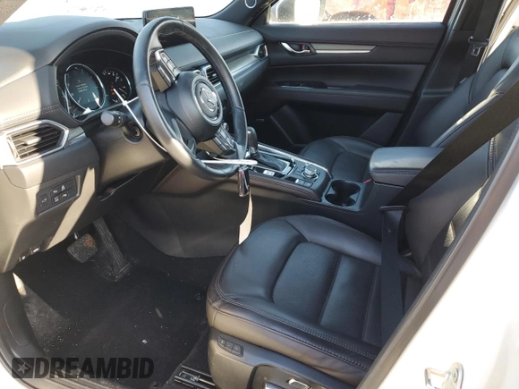 2021 Mazda CX-5 Signature with VIN JM3KFBEY5M0447759, listed as a Copart auction lot 42565535 with 24,175 mi miles and Salvage Title. Bid and sale history available at carsss.com. Image 7.