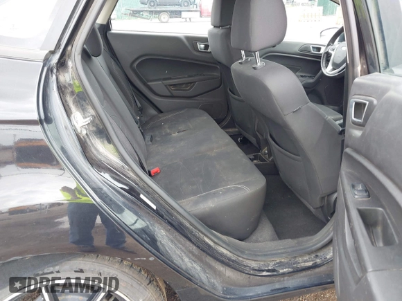 2015 Ford Fiesta SE with VIN 3FADP4BJXFM135864, listed as a IAAI auction lot 39462016 with 113,486 mi miles and . Bid and sale history available at DreamBid. Image 8.