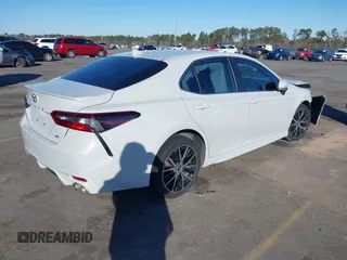 2023 Toyota Camry SE z VIN 4T1G11AK5PU095414, wystawiony jako IAAI lot #41729717 z przebiegiem 35 233 mil mil oraz . Historia ofert i sprzedaży dostępna na DreamBid. Obrazek 4.