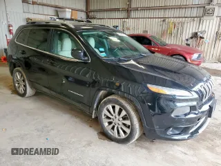 2016 Jeep Cherokee Overland with VIN 1C4PJLJB7GW336121, listed as a Copart auction lot 59692375 with 231,251 mi miles and Clean title. Bid and sale history available at DreamBid. Image 4.
