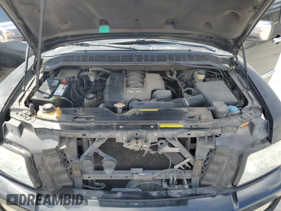 2005 Infiniti QX56 z VIN 5N3AA08C65N800718, wystawiony jako Copart lot #54229265 z przebiegiem 222 803 mil mil oraz Szkoda całkowita • Salvage title. Historia ofert i sprzedaży dostępna na DreamBid. Obrazek 12.