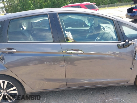 2020 Honda Fit EX-L z VIN 3HGGK5H90LM701665, wystawiony jako IAAI lot #42209084 z przebiegiem 79 395 mil mil oraz . Historia ofert i sprzedaży dostępna na DreamBid. Obrazek 13.