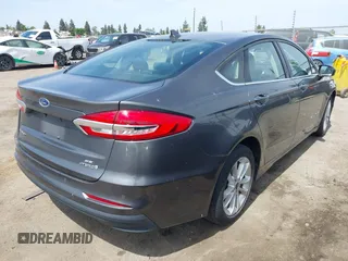 2019 Ford Fusion SE with VIN 3FA6P0LU3KR174108, listed as a IAAI auction lot 42094264 with 87,700 mi miles and . Bid and sale history available at carsss.com. Image 4.