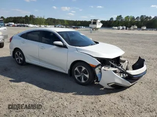 2019 Honda Civic LX with VIN 19XFC2F63KE012498, listed as a Copart auction lot 51958255 with 115,419 mi miles and Salvage Title. Bid and sale history available at DreamBid. Image 4.