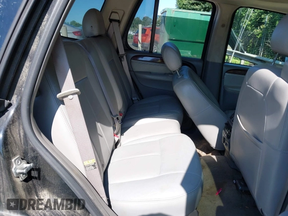 2005 GMC Envoy SLE with VIN 1GKDS13S452208252, listed as a IAAI auction lot 42357457 with 197,419 mi miles and . Bid and sale history available at DreamBid. Image 8.