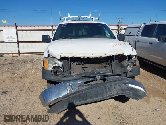 2012 Ford F-150 XL with VIN 1FTMF1CM9CKD33309, listed as a IAAI auction lot 41427178 with 125,029 mi miles. Bid and sale history available at carsss.com. Image 6.
