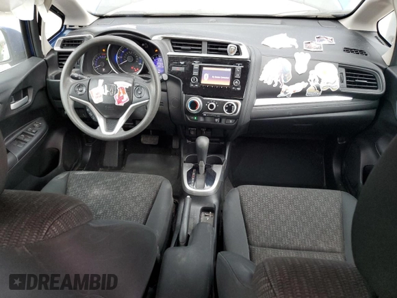 2017 Honda Fit LX with VIN 3HGGK5H55HM703996, listed as a Copart auction lot 61653735 with 77,028 mi miles and Salvage title. Bid and sale history available at DreamBid. Image 8.