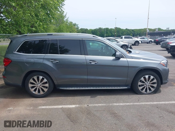 2019 Mercedes-Benz GLS 450 with VIN 4JGDF6EE1KB226588, listed as a IAAI auction lot 42310009 with 116,124 mi miles and . Bid and sale history available at DreamBid. Image 13.