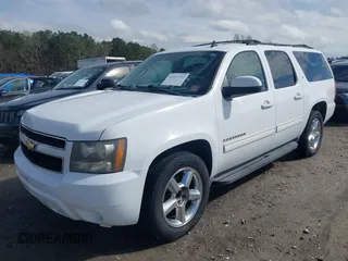 2011 Chevrolet Suburban LT with VIN 1GNSCJE01BR291466, listed as a IAAI auction lot 41800799 with 232,542 mi miles. Bid and sale history available at carsss.com. Image 2.