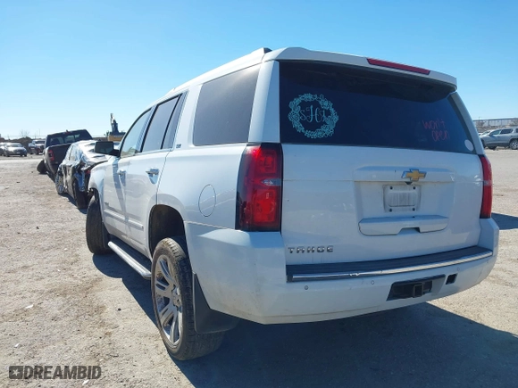 2016 Chevrolet Tahoe LTZ with VIN 1GNSKCKCXGR341155, listed as a IAAI auction lot 41244868 with 163,455 mi miles. Bid and sale history available at carsss.com. Image 3.