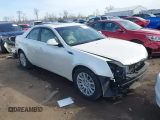 2013 Cadillac CTS Luxury z VIN 1G6DG5E53D0113612, wystawiony jako IAAI lot #41690772 z przebiegiem 78 446 mil mil oraz . Historia ofert i sprzedaży dostępna na DreamBid. Obrazek 1.