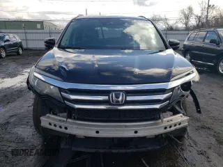 2017 Honda Pilot Touring with VIN 5FNYF6H90HB028112, listed as a Copart auction lot 52197645 with 218,944 mi miles and Salvage Title. Bid and sale history available at DreamBid. Image 5.