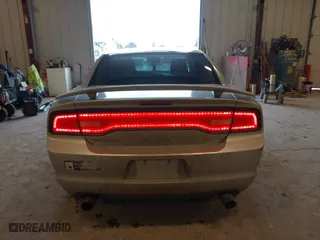 2011 Dodge Charger SE with VIN 2B3CL3CG0BH615016, listed as a IAAI auction lot 41669366 with 203,197 mi miles. Bid and sale history available at carsss.com. Image 16.