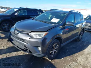 2018 Toyota RAV4 XLE with VIN 2T3WFREV2JW509988, listed as a IAAI auction lot 41729250 with 96,135 mi miles. Bid and sale history available at carsss.com. Image 17.
