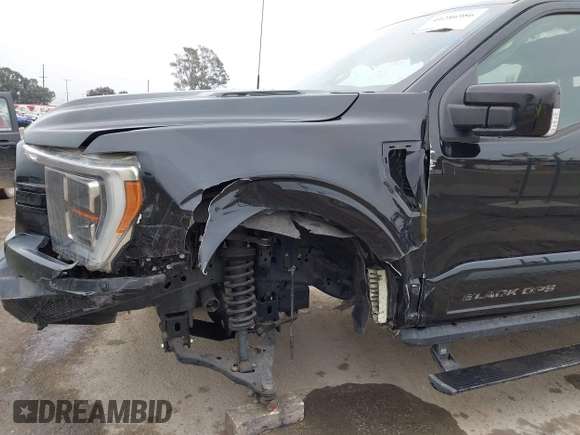 2021 Ford F-150 XL with VIN 1FTFW1E50MKF07932, listed as a IAAI auction lot 41286986 with 14,721 mi miles. Bid and sale history available at carsss.com. Image 6.