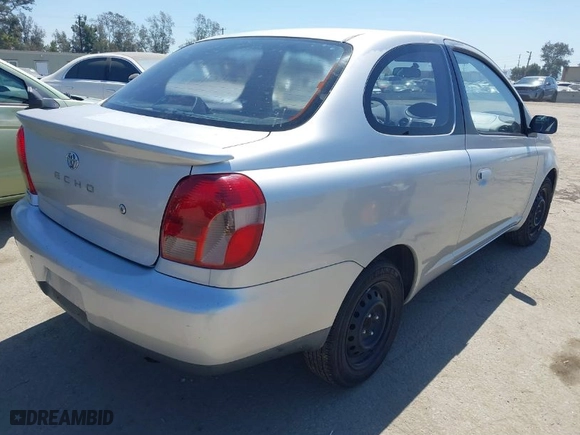 2002 Toyota ECHO with VIN JTDAT123920230177, listed as a IAAI auction lot 42030596 with 184,146 mi miles. Bid and sale history available at carsss.com. Image 4.