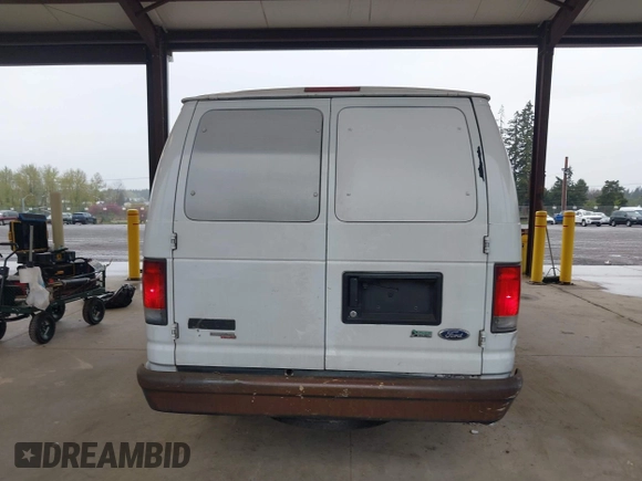 2014 Ford Econoline Cargo Commercial with VIN 1FTNS2EW6EDA03445, listed as a IAAI auction lot 41973556 with 231,391 mi miles. Bid and sale history available at carsss.com. Image 16.