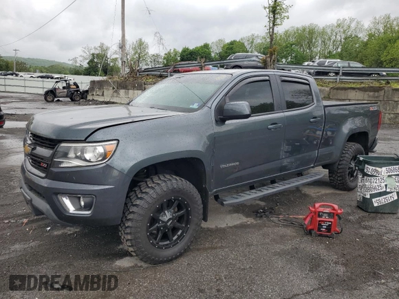 2015 Chevrolet Colorado 4WD Z71 with VIN 1GCGTCE35F1272962, listed as a Copart auction lot 55525325 with 129,701 mi miles and Salvage title. Bid and sale history available at DreamBid. Image 1.