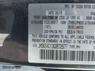 2016 Mazda CX-5 Touring with VIN JM3KE4CY3G0672977, listed as a IAAI auction lot 41889137 with 130,593 mi miles. Bid and sale history available at carsss.com. Image 9.