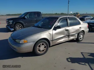 2001 Chevrolet Prizm with VIN 1Y1SK54811Z411948, listed as a IAAI auction lot 40874344 with 1 mi miles. Bid and sale history available at carsss.com. Image 2.