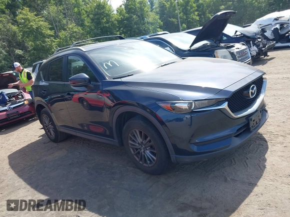 2017 Mazda CX-5 Touring z VIN JM3KFBCL5H0133493, wystawiony jako IAAI lot #39666644 z przebiegiem 125 048 mil mil oraz . Historia ofert i sprzedaży dostępna na DreamBid. Obrazek 1.