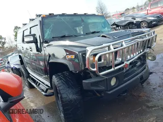 2006 Hummer H2 with VIN 5GRGN23U06H113353, listed as a IAAI auction lot 41476649 with 165,370 mi miles. Bid and sale history available at carsss.com. Image 1.