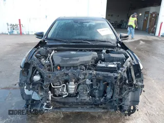 2015 Acura TLX Advance z VIN 19UUB3F72FA010258, wystawiony jako IAAI lot #41208796 z przebiegiem 158 125 mil mil oraz . Historia ofert i sprzedaży dostępna na DreamBid. Obrazek 13.