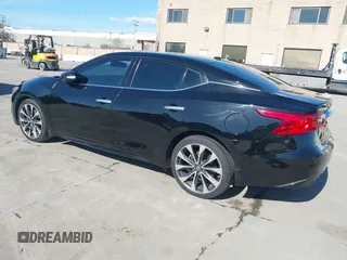 2016 Nissan Maxima SL with VIN 1N4AA6AP9GC448087, listed as a IAAI auction lot 41828781 with 99,436 mi miles and . Bid and sale history available at DreamBid. Image 3.