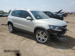 2013 Volkswagen Tiguan S with VIN WVGAV3AX6DW588083, listed as a Copart auction lot 60114965 with 109,318 mi miles and Salvage title. Bid and sale history available at DreamBid. Image 4.