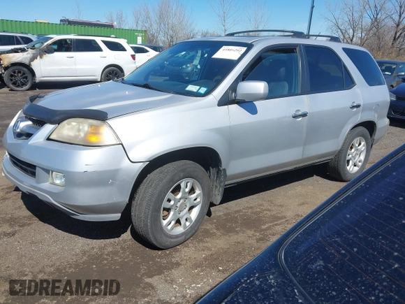2004 Acura MDX Touring Pkg RES w/Nav with VIN 2HNYD189X4H523022, listed as a IAAI auction lot 41804292 with 165,586 mi miles. Bid and sale history available at carsss.com. Image 2.