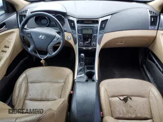 2012 Hyundai Sonata Hybrid with VIN KMHEC4A4XCA057497, listed as a Copart auction lot 82206914 with Not Provided miles and Salvage Title. Bid and sale history available at DreamBid. Image 8.