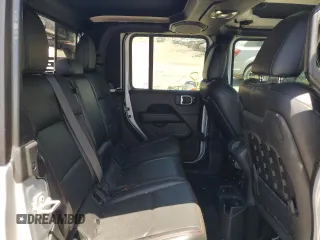 2022 Jeep Gladiator Rubicon z VIN 1C6JJTBG6NL104521, wystawiony jako Copart lot #57325365 z przebiegiem 31 498 mil mil oraz Szkoda całkowita • Salvage title. Historia ofert i sprzedaży dostępna na DreamBid. Obrazek 10.