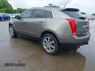 2012 Cadillac SRX Premium Collection z VIN 3GYFNCE3XCS620507, wystawiony jako IAAI lot #42348835 z przebiegiem 184 737 mil mil oraz . Historia ofert i sprzedaży dostępna na DreamBid. Obrazek 3.