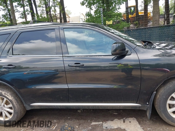 2014 Dodge Durango SXT z VIN 1C4RDJAG0EC972801, wystawiony jako IAAI lot #42754686 z przebiegiem 210 458 mil mil oraz . Historia ofert i sprzedaży dostępna na DreamBid. Obrazek 13.