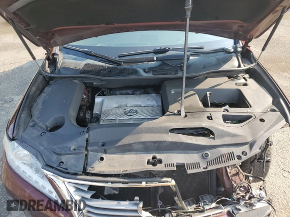 2015 Lexus RX 350 with VIN 2T2BK1BA4FC253122, listed as a Copart auction lot 60499695 with 161,686 mi miles and Salvage title. Bid and sale history available at DreamBid. Image 12.